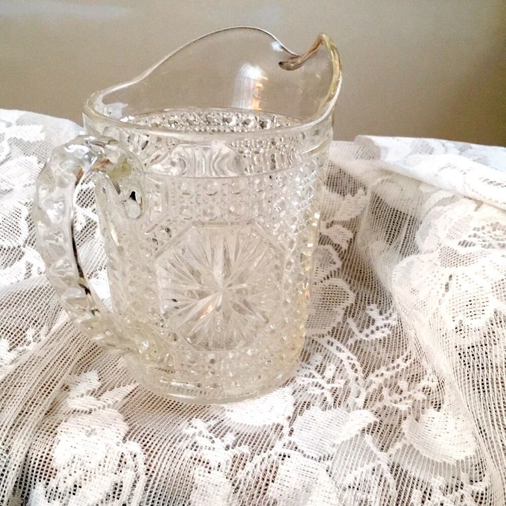 EAPG pressed glass pitcher. 6 1/2 x 6”. Cane and star pattern.